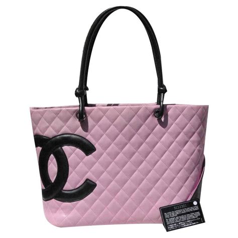 pink chanel purae|chanel purses pink and black.